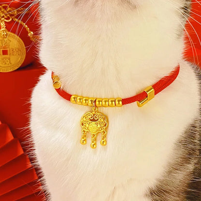 Collier tissu rouge petit chien pendentif doré