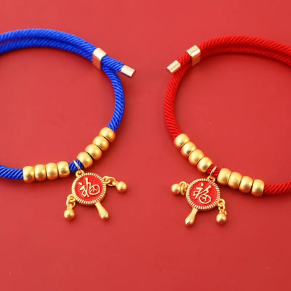 Collier tissu rouge petit chien pendentif doré