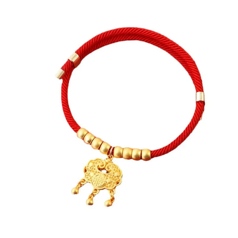 Collier tissu rouge petit chien pendentif doré