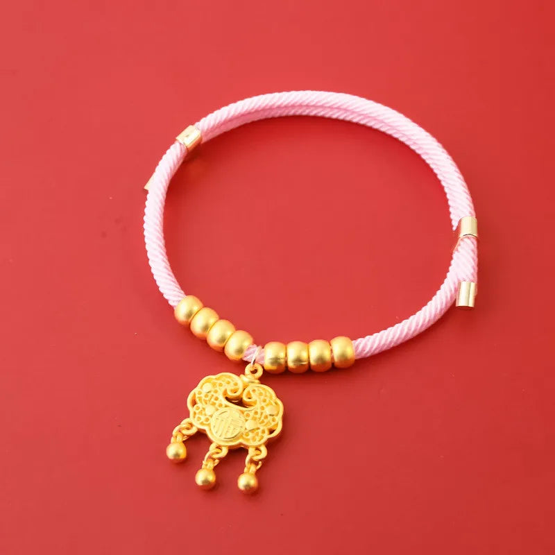 Collier tissu rouge petit chien pendentif doré