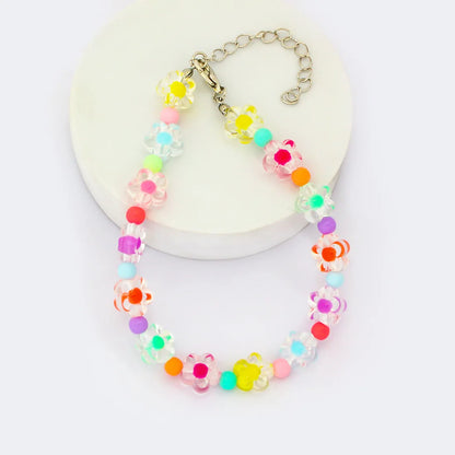 Collier pour petit chien à perles et fleurs pastel