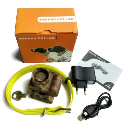 Kit collier beeper rechargeable avec boîte, chargeur, câble USB et notice sur fond blanc.