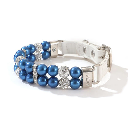 Collier de luxe pour chien à double rang de perles bleues avec strass scintillants.