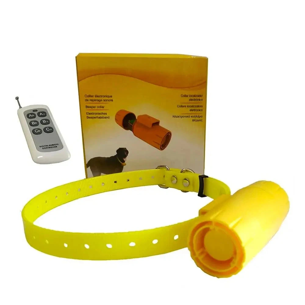 Kit collier beeper jaune pour chien de chasse avec télécommande et boîte produit sur fond blanc.