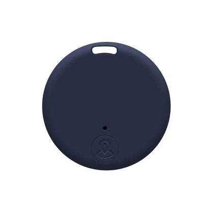Traceur Bluetooth anti-perte rond en coloris bleu marine, avec œillet de fixation en haut et bouton central arrondi avec icône de localisation sur fond blanc.