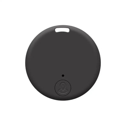 Traceur Bluetooth anti-perte rond en coloris noir, avec œillet de fixation en haut et bouton central arrondi avec icône de localisation sur fond blanc.
